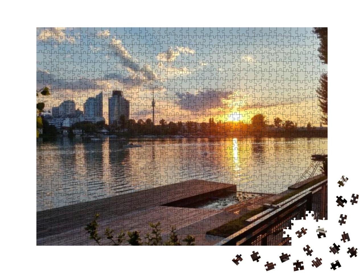 Puzzle 1000 Teile „Alte Donau bei Sonnenuntergang, Wien“
