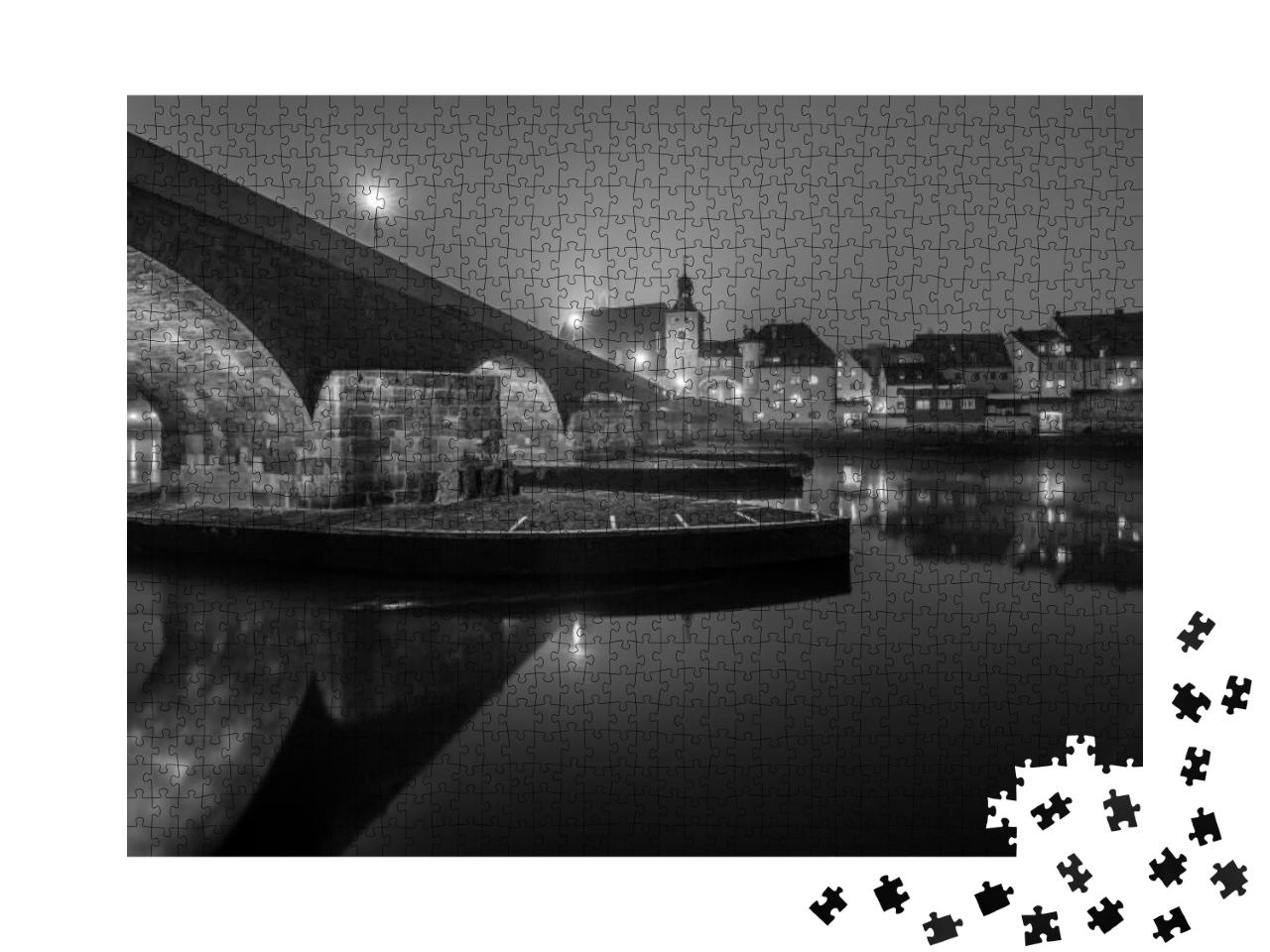 Puzzle 1000 Teile „Steinbrücke in Regensburg bei Nacht“