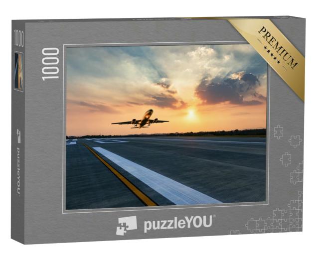 Puzzle 1000 Teile „Start eines Passagierflugzeugs im Abendhimmel“