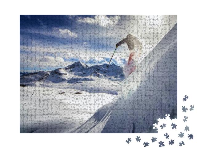 Puzzle 1000 Teile „Skifahrer, der einen steilen Hang hinunterfährt “