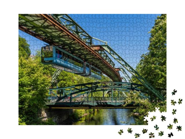 Puzzle 1000 Teile „Einzigartige Schwebebahn in Wuppertal“