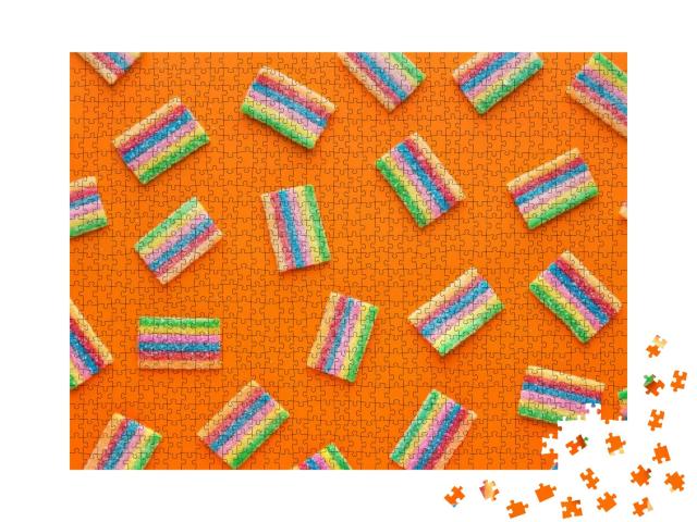 Puzzle 1000 Teile „Bunte Gummibärchen auf orangem Hintergrund “