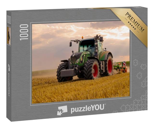 Puzzle 1000 Teile „Grüner Traktor pflügt ein Getreidefeld “