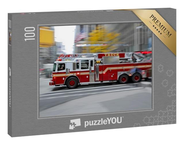 Puzzle 100 Teile „Feuerwehrauto auf schnellstem Weg zum Einsatzort“