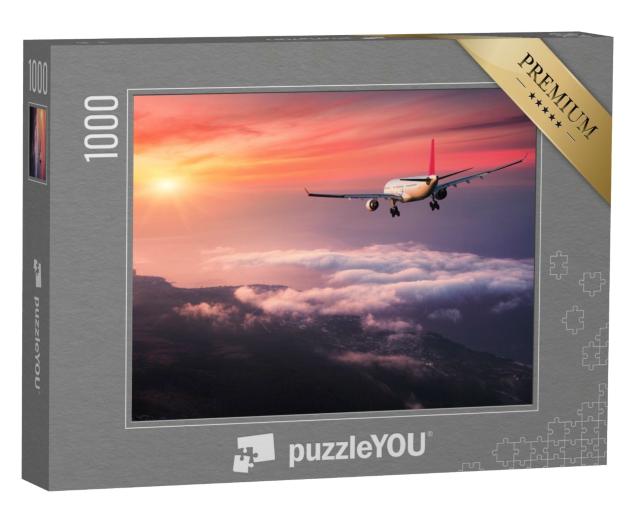 Puzzle 1000 Teile „Flugzeug im roten Abendhimmel über den Wolken“