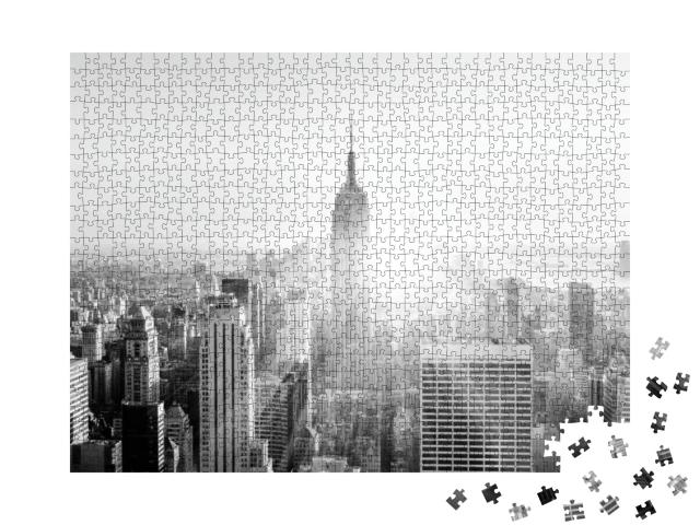 Puzzle 1000 Teile „New York City: Manhattan mit beleuchtetem Empire State Building“