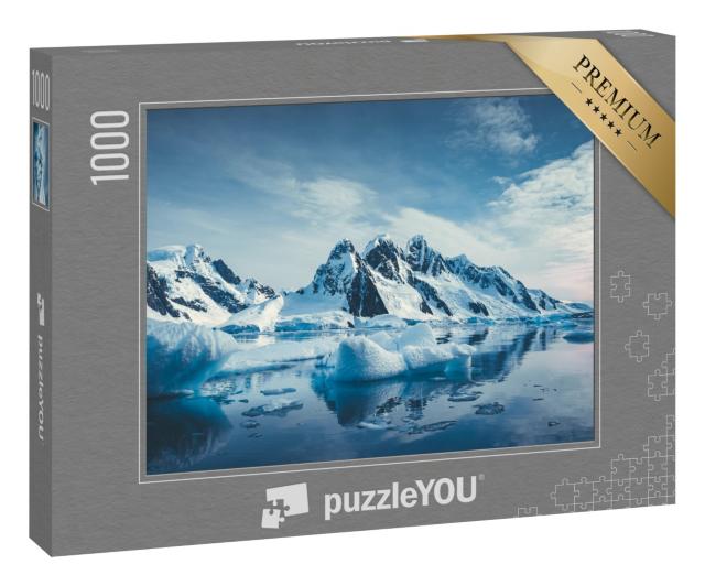 Puzzle 1000 Teile „Antarktischer Winter: eisbedeckte Berge im Südpolarmeer“