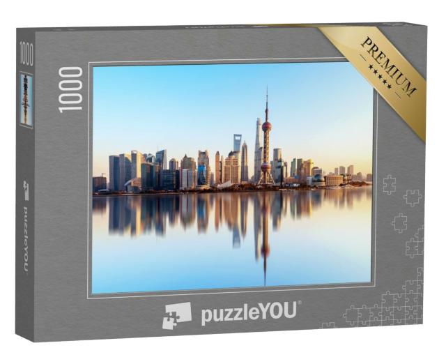 Puzzle 1000 Teile „Skyline von Shanghai mit Wasserreflektion“