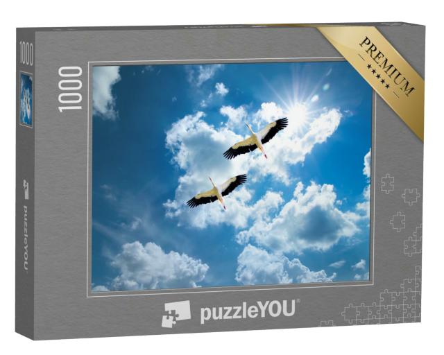 Puzzle 1000 Teile „Zwei Störche auf dem Weg in die Heimat“