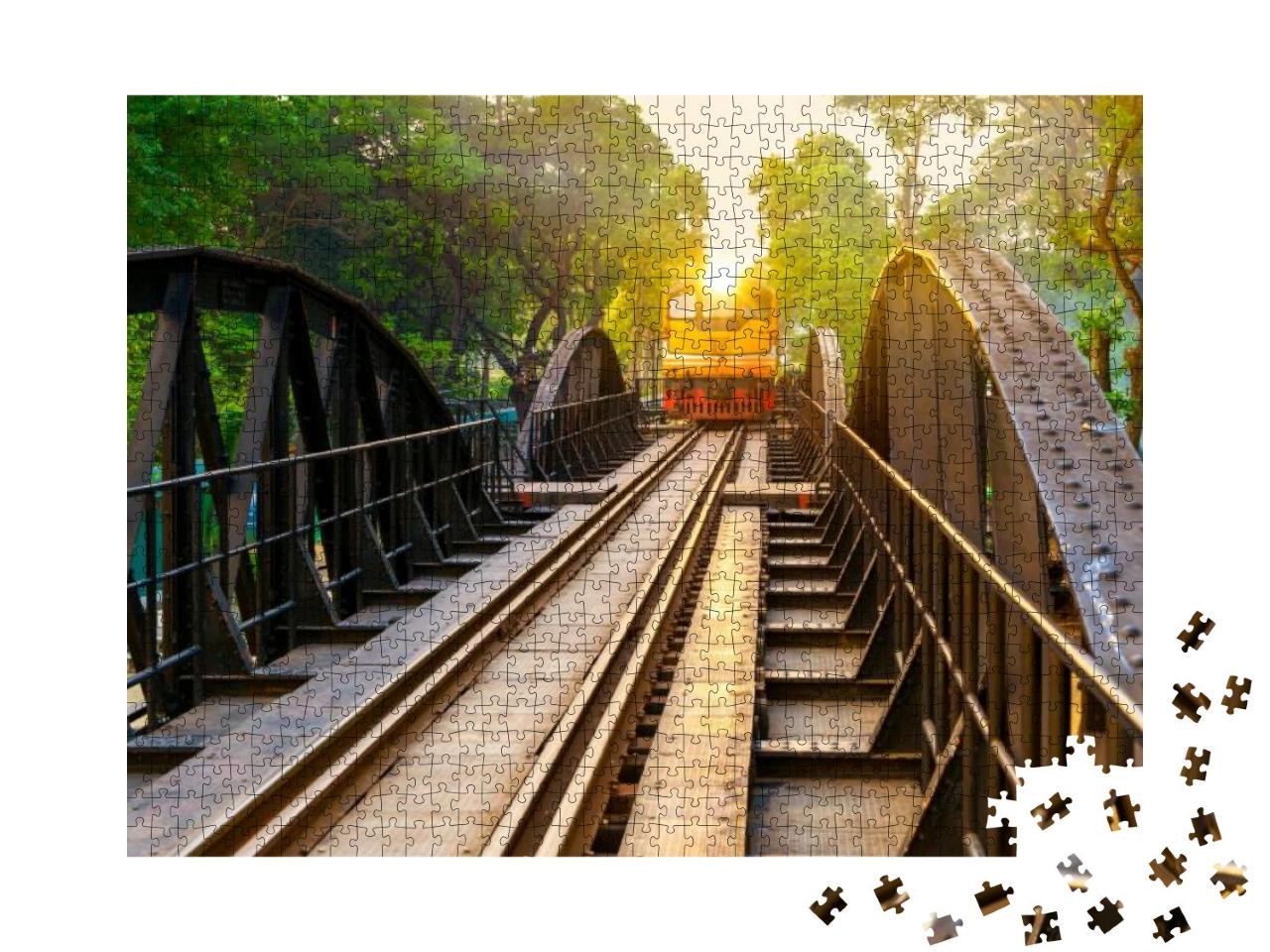 Puzzle 1000 Teile „Alter Zug auf der Brücke am Fluss Kwai in Kanchanaburi, Thailand“