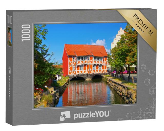Puzzle 1000 Teile „Die Altstadt von Wismar in Norddeutschland, das rote Haus“