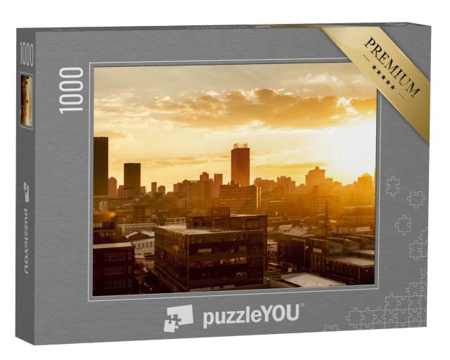 Puzzle 1000 Teile „Stadt im Sonnenuntergang“