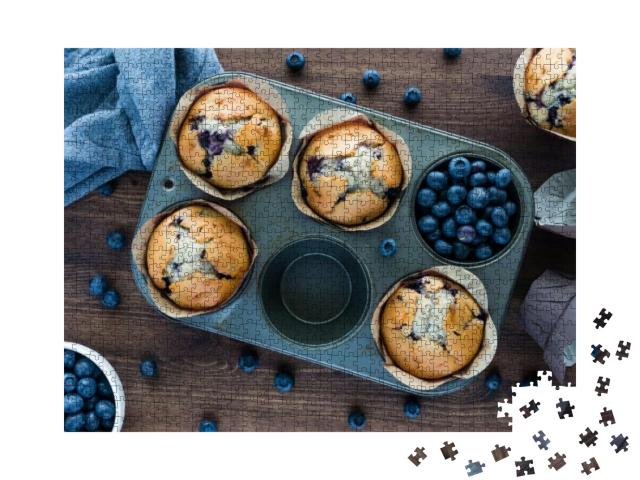 Puzzle 1000 Teile „Frisch gebackene Blaubeer-Muffins in einer Muffinform“