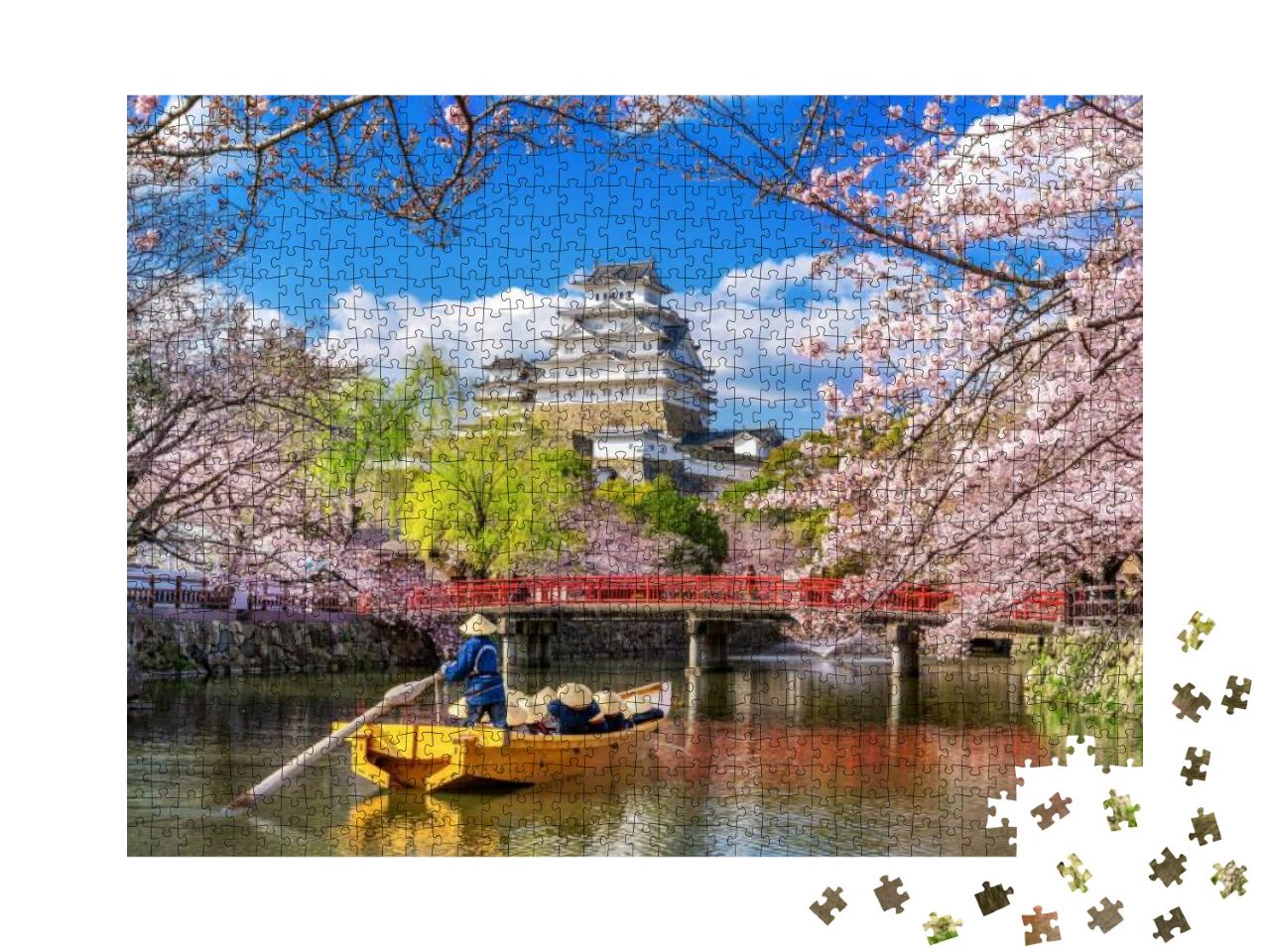 Puzzle 1000 Teile „Kirschblüten und Burg in Himeji, Japan“