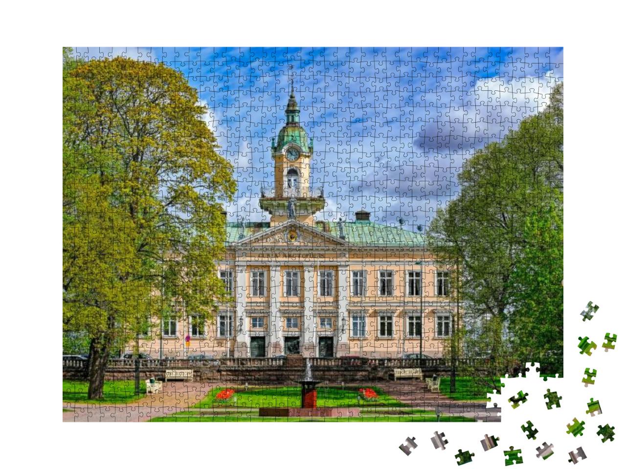 Puzzle 1000 Teile „Raatihuoneenpuisto, der Rathauspark von Pori, Finnland“