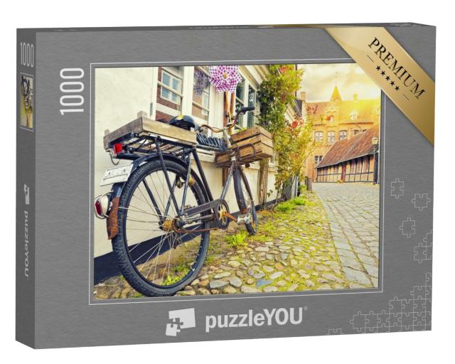 Puzzle 1000 Teile „Vintage-Fahrrad vor einer Hauswand bei Sonnenuntergang in Ribe“