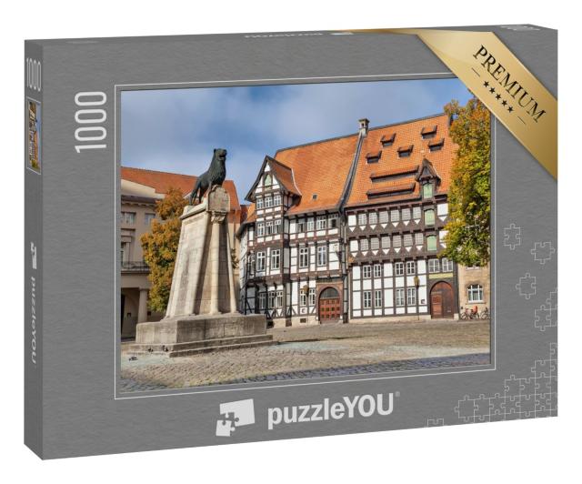 Puzzle 1000 Teile „Löwenstatue und Fachwerkhaus auf dem Burgplatz in Braunschweig“