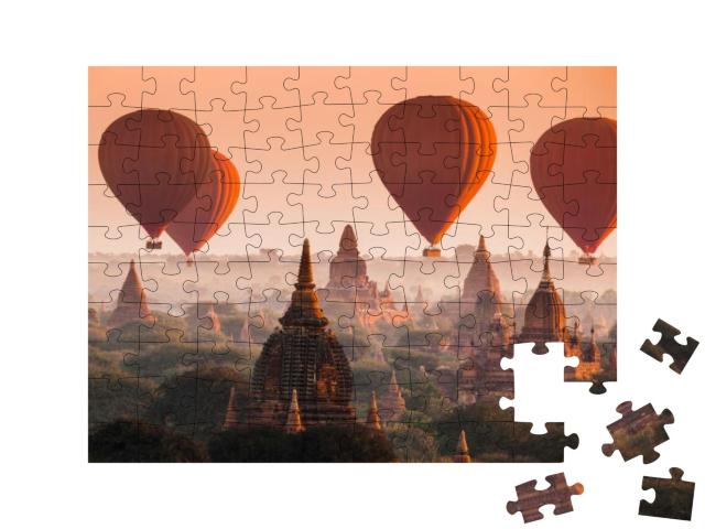 Puzzle 100 Teile „Heißluftballon über der Ebene von Bagan am nebligen Morgen, Myanmar“