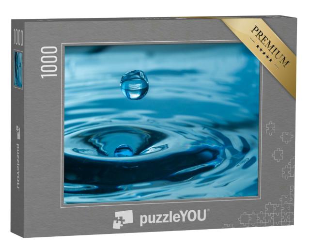 Puzzle 1000 Teile „Wassertropfen spritzen in ein Glas “