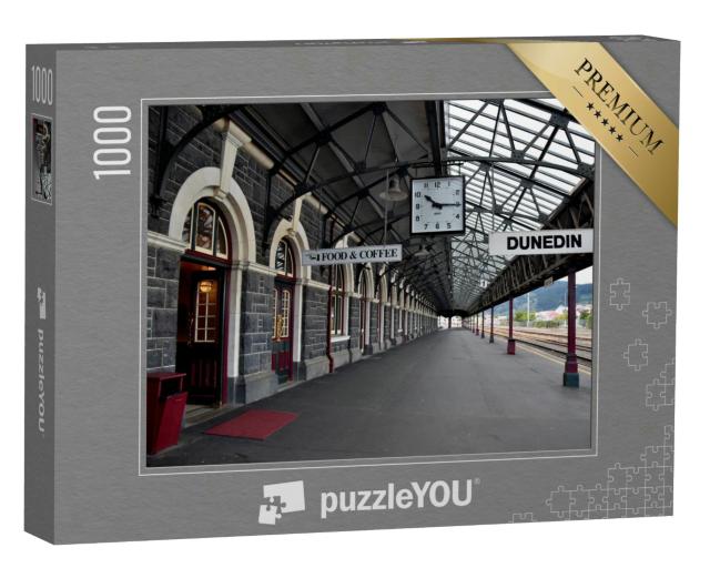 Puzzle 1000 Teile „Morgens um 10.15 Uhr ist der Bahnhof von Dunedin leer“