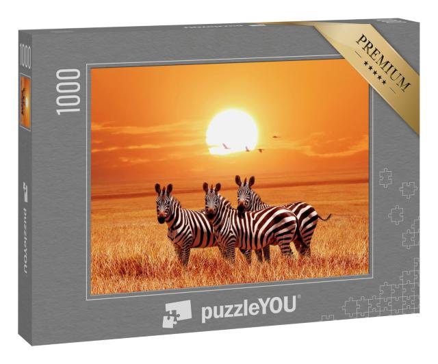 Puzzle 1000 Teile „Zebras im Sonnenuntergang, Serengeti-Nationalpark“