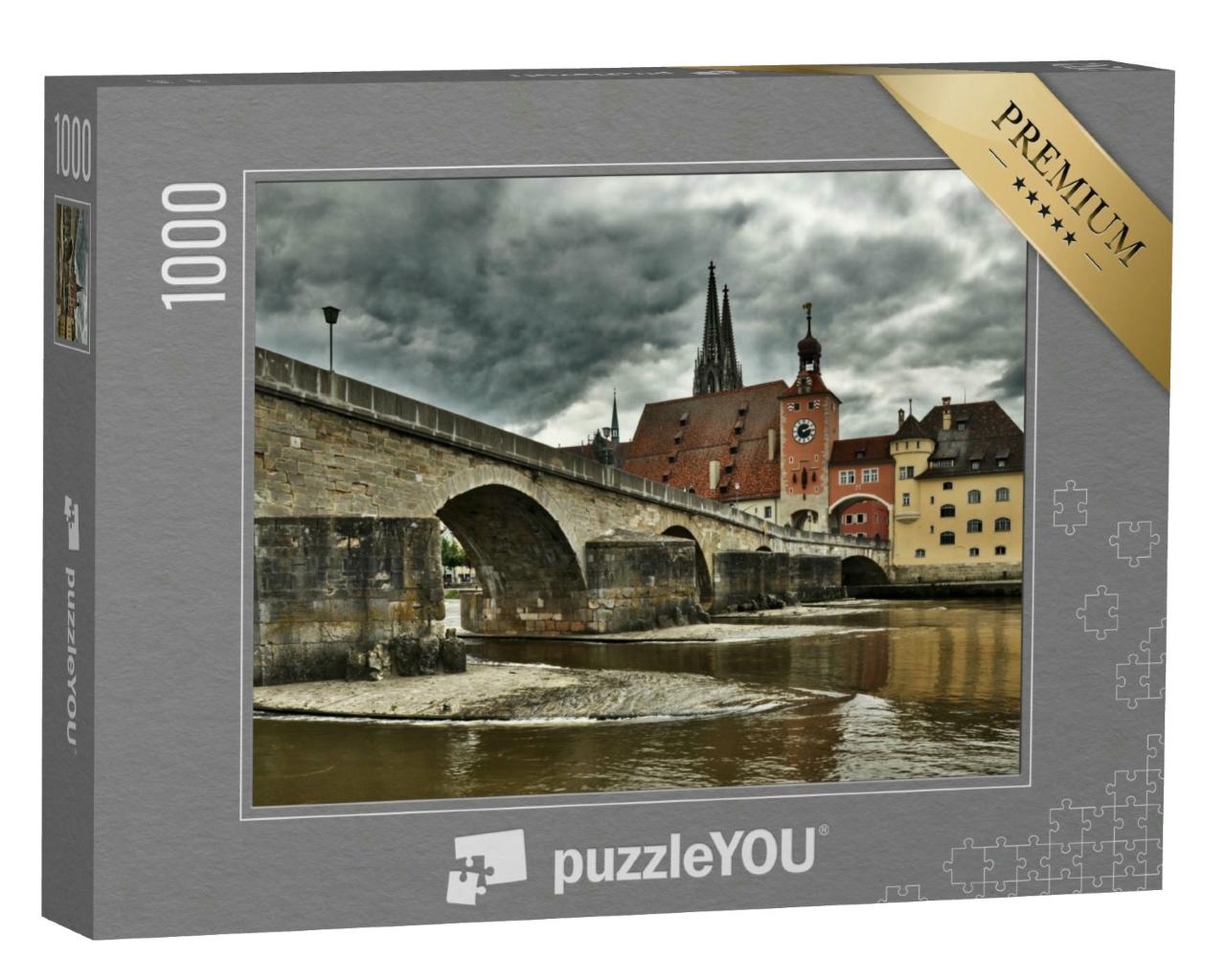 Puzzle 1000 Teile „Regensburg mit Steinbrücke und Dom St. Peter“