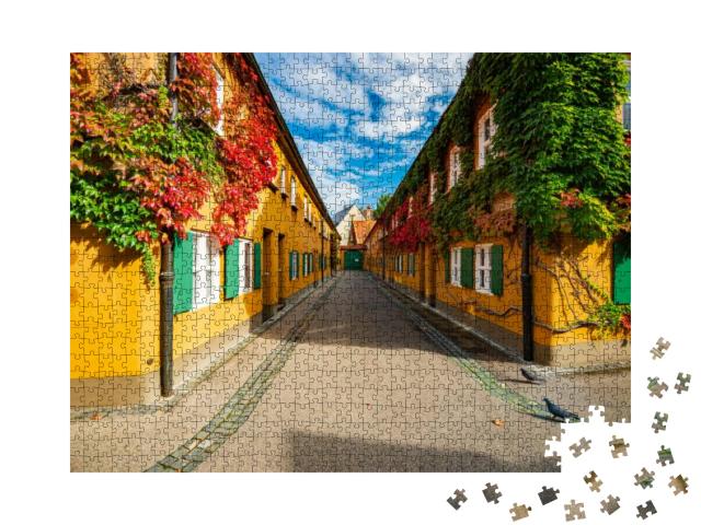 Puzzle 1000 Teile „Die Fuggerei in der Stadt Augsburg, Deutschland“