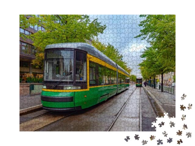 Puzzle 1000 Teile „Moderne Straßenbahn auf der Straße in Helsinki, Finnland“