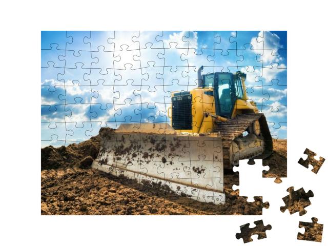 Puzzle 100 Teile „Gelber Bagger auf einer neuen Baustelle “