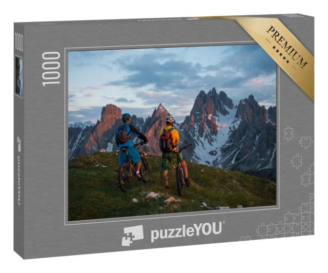 Puzzle 1000 Teile „Mit dem Fahrrad auf dem Berggipfel“