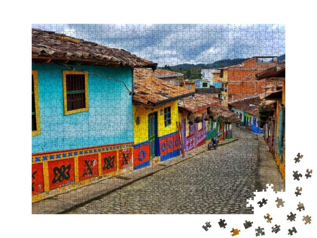 Puzzle 1000 Teile „Ansicht von Guatapé Kolumbien, farbige Fassaden und Traditon“