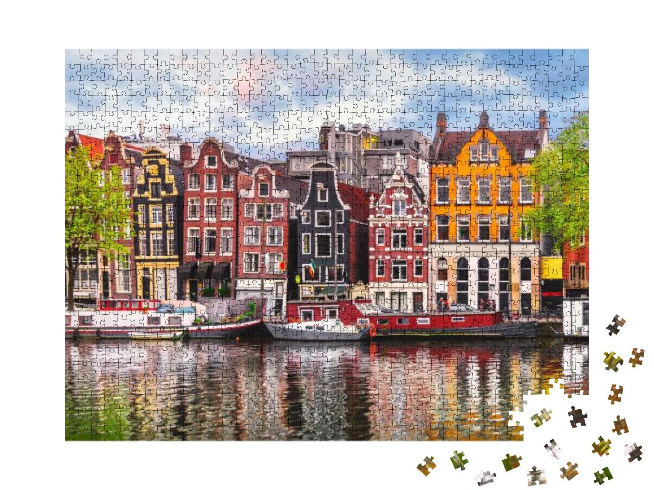 Puzzle 1000 Teile „Die tanzenden Häuser an der Amstel, Wahrzeichen von Amsterdam“