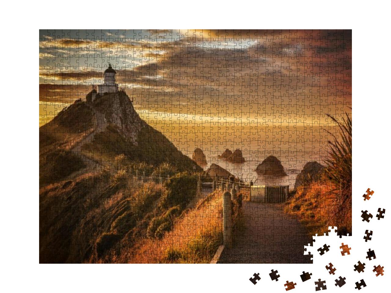 Puzzle 1000 Teile „Ein stimmungsvoller Sonnenaufgang am Nugget Point in Otago, Neuseeland“