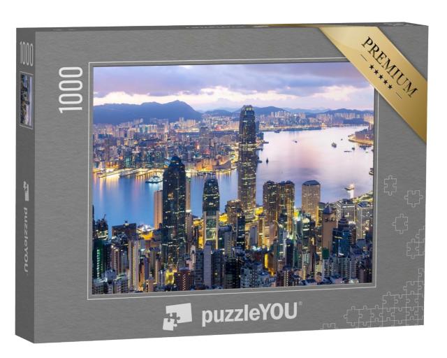 Puzzle 1000 Teile „Sonnenaufgang über dem hell erleuchteten Hongkong“