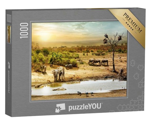 Puzzle 1000 Teile „Tiere am Wasserloch im Sonnenuntergang südafrikanische Wüste“
