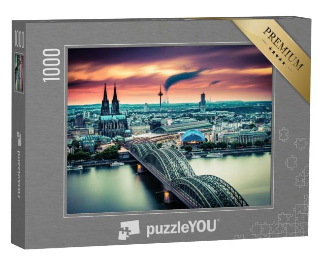Puzzle 1000 Teile „Sonnenuntergang und bewegte Wolken über Köln, Deutschland“