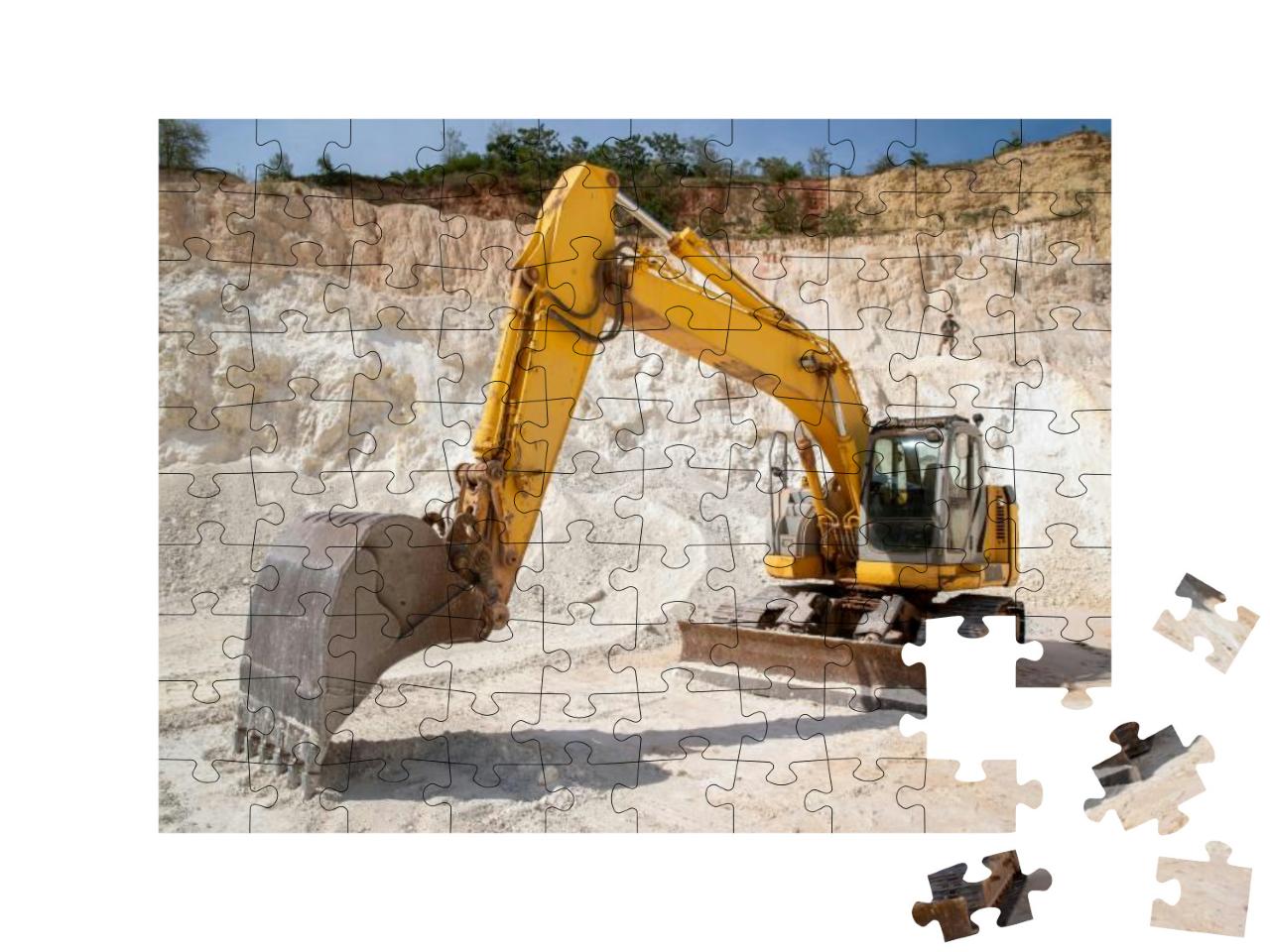 Puzzle 100 Teile „Hydraulischer Raupenbagger bei der Arbeit im Steinbruch“