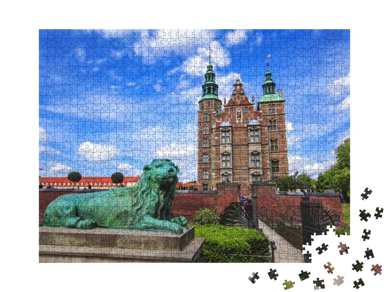 Puzzle 1000 Teile „Skulptur des Löwen am Schloss Rosenborg unter weitem blauem Himmel“