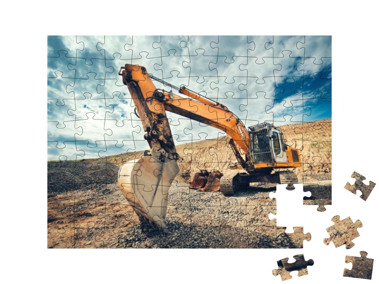 Puzzle 100 Teile „Nahaufnahme eines Industriebaggers auf einer Baustelle“