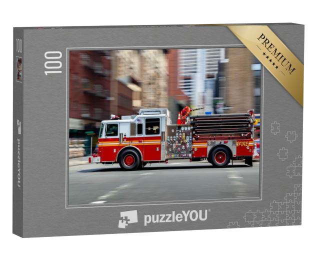 Puzzle 100 Teile „Feuerwehrauto auf dem Weg zum Einsatz in NYC“