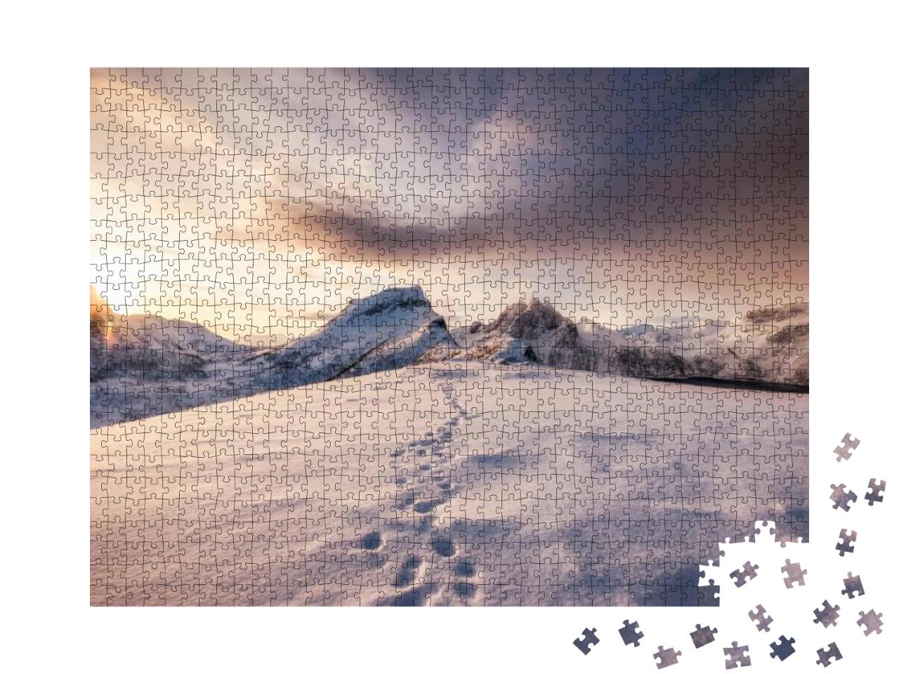 Puzzle 1000 Teile „Spuren im Schnee beim Sonnenaufgang in den Bergen“