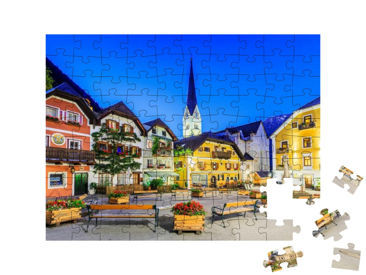 Puzzle 100 Teile „Hallstatt, Österreich, Bergdorf in den österreichischen Alpen bei Dämmerung“