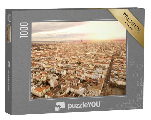 Puzzle 1000 Teile „Vogelperspektive auf Wien bei Sonnenuntergang“