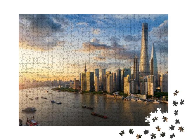 Puzzle 1000 Teile „Blick über den Huangpu-Fluss auf die Skyline von Shanghai“