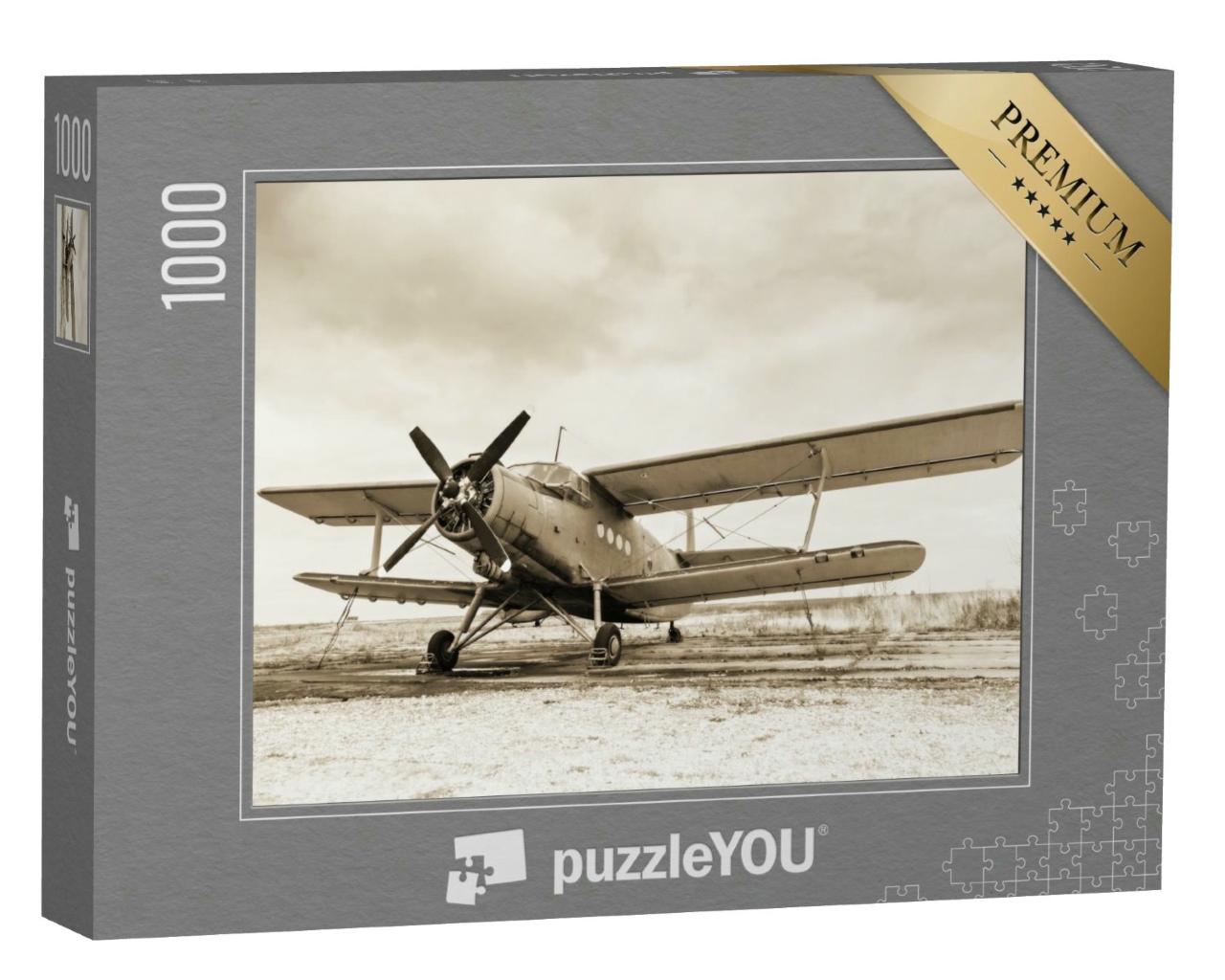 Puzzle 1000 Teile „Altes Flugzeug auf dem Rollfeld, sepia“