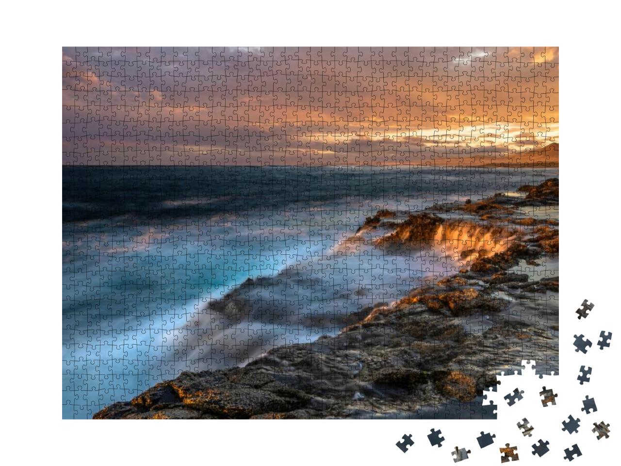 Puzzle 1000 Teile „Beeindruckender Sonnenuntergang über den felsigen Klippen von Fuerteventura“