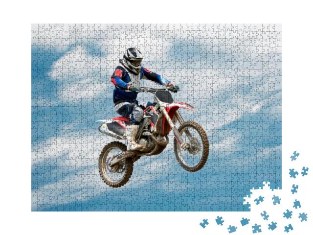 Puzzle 1000 Teile „Biker beim Stunt in der Luft“