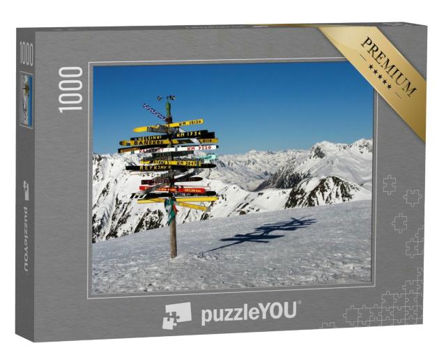 Puzzle 1000 Teile „Wegweiser mit internationalen Städten in den Alpen, Ischgl, Österreich“