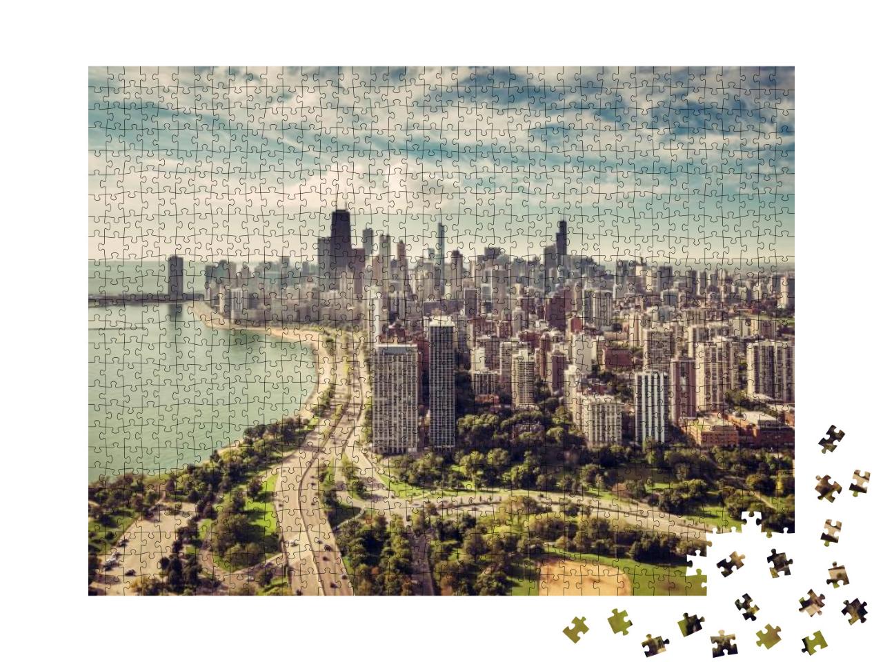 Puzzle 1000 Teile „Chicago Skyline mit Straße am Strand aus der Luft“
