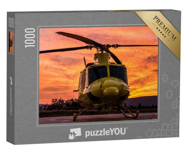 Puzzle 1000 Teile „Hubschrauber im spektakulären Sonnenuntergang“